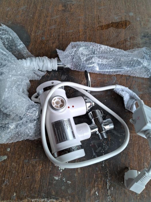 Проточный електроводонагреватель