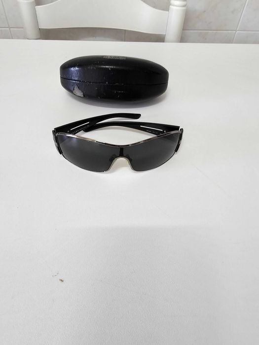 OCulos de Sol como novos PRADA