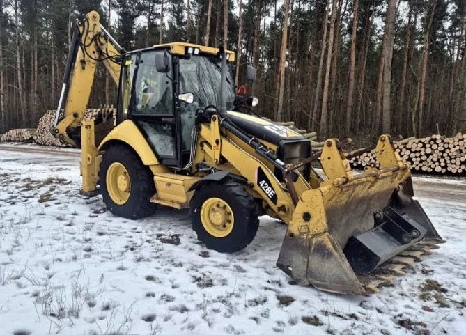 Transport ziemi kamienia piasku gruzu uslugi koparko ładowarką