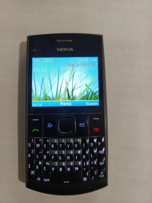 Nokia X2-01 мобильный телефон 48$