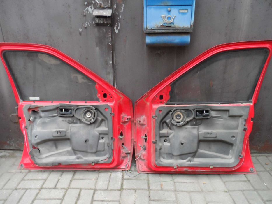 Двері передні або задні Ford Orion Mk3/Escort Mk5