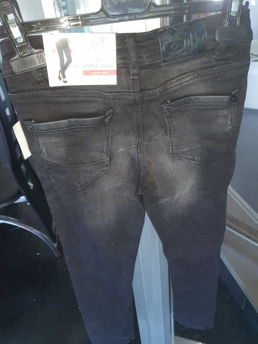 Calças ganga pretas novas