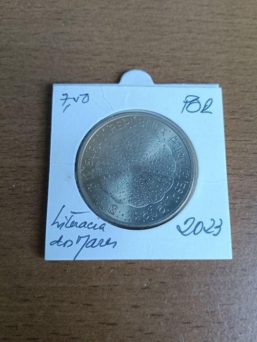 4 moedas de 5€ e uma de 7,5€