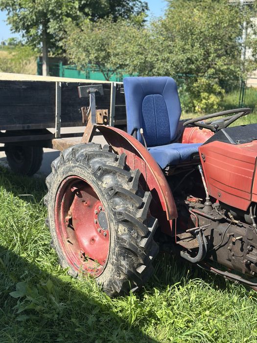 Трактор універсал 445 , причеп , косарка роторна z-069