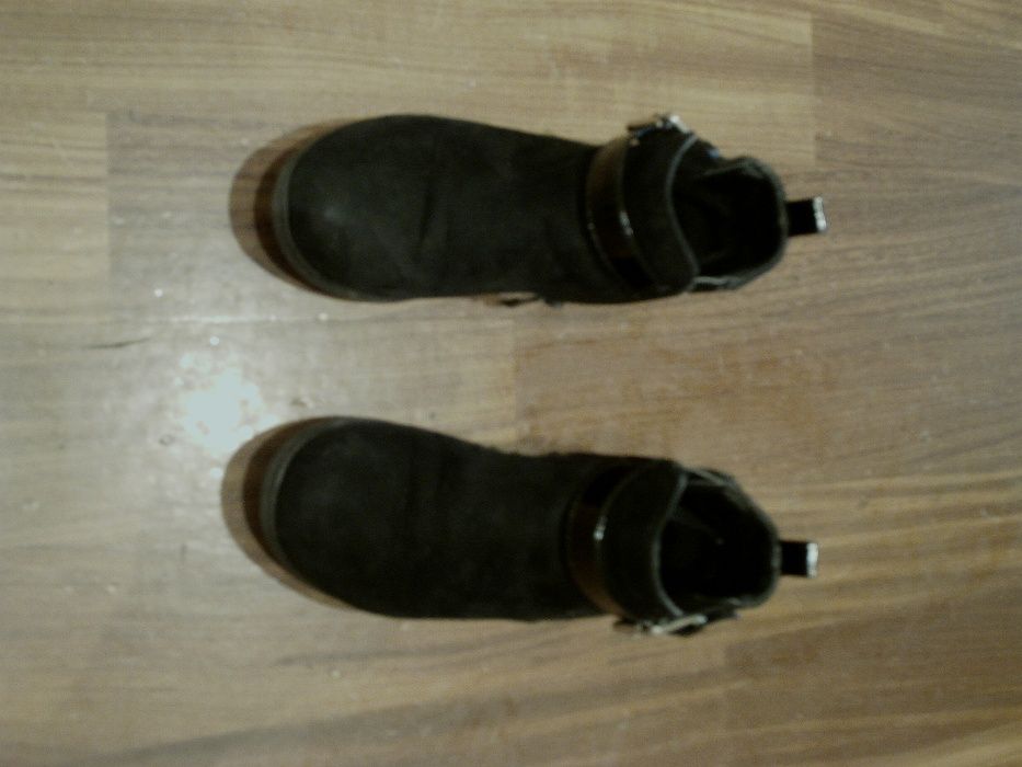 Botas practicamente novas