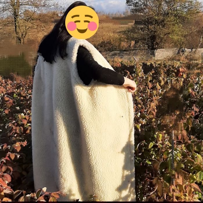 Теплий довгий двошаровий жилет нижче коліна з овчини