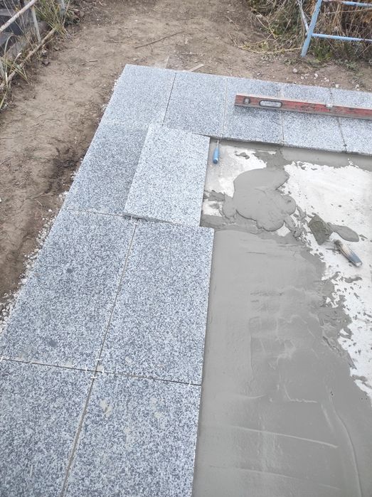 Гранитная плитка серая полированная Покостовска 60*30*2см. в Каменском