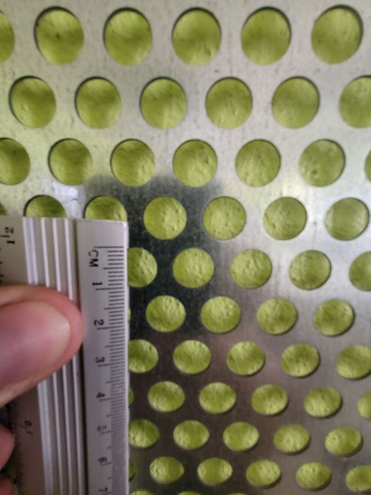 Painel de chapa perfurada