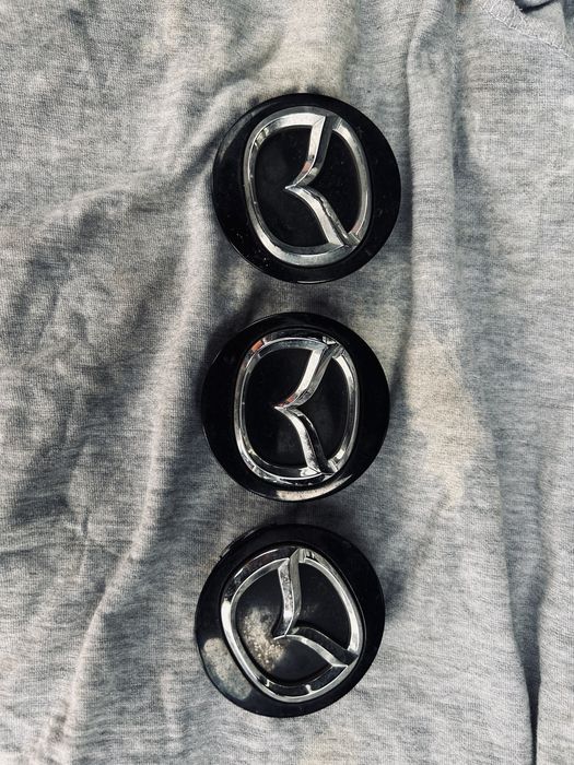 Продам оригинальные колпачки для дисков mazda