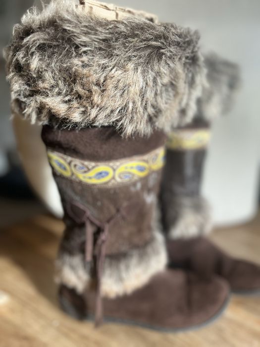 Botas castanhas de Pelo