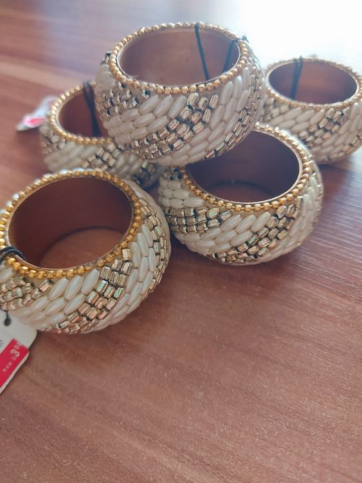 Porta-guardanapos dourados