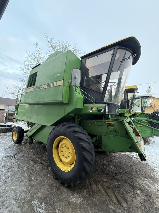 Свіжопривезений John Deere 1065 , Klima, жатка 3,65 візок Хороший стан