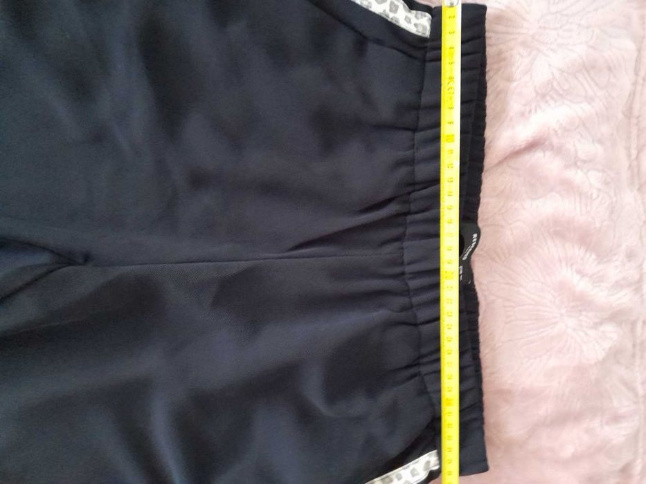 Granatowe spodnie Reserved r. 38