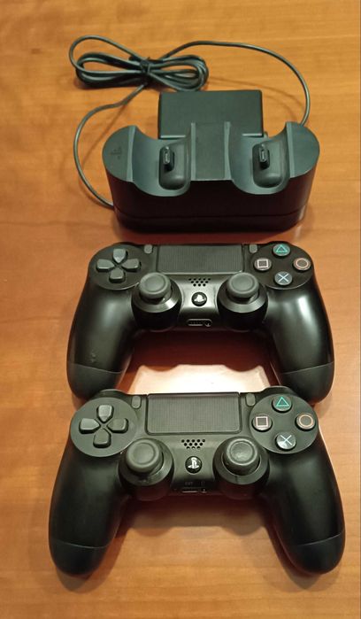 PlayStation 4 (PS4) Console with 2 Controllers, Charger, and 4 Games64309592920194121