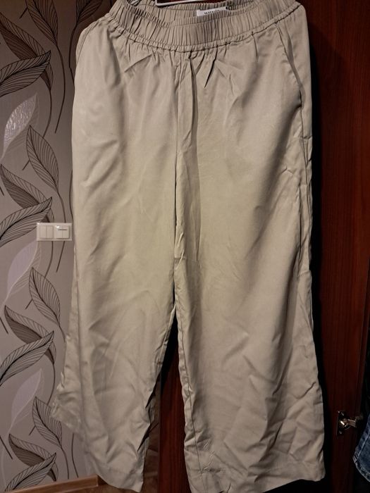 damskie szerokie spodnie letnie reserved