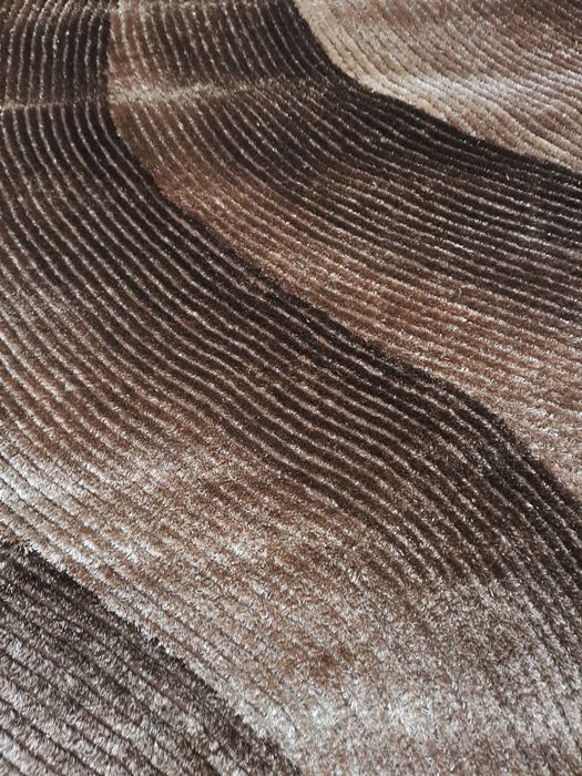 Carpete nova de cor castanho em degrade