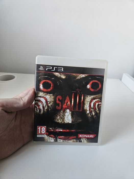 Saw PS3, piła ps3, okładka angielska,