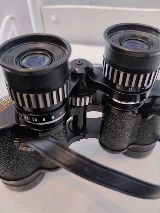 Японский бинокль Tasco 7-15х35 Zoom. Надійна техніка
