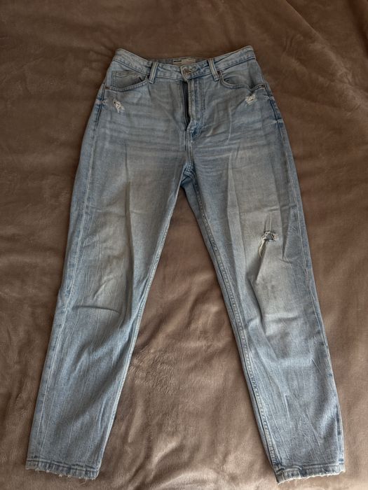 Джинси синього кольору