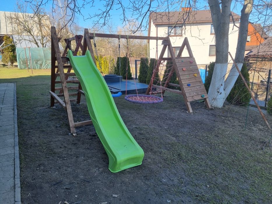 Plac zabaw zjeżdżalnia wspinaczka huśtawka  bocianie gniazdo