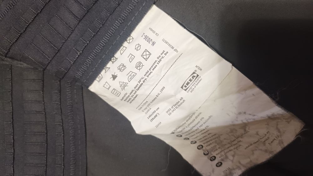 Штори темно-сірі, теракотові, ванільні з квіткою.