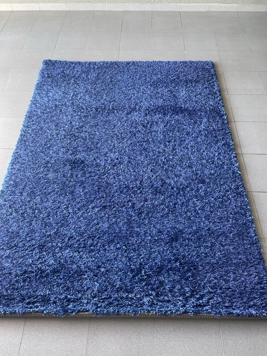 Tapete azul de pelo