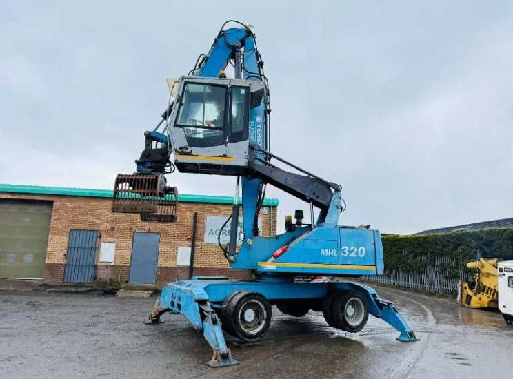 Екскаватор для перевалки лісу , металолома FUCHS MHL 320