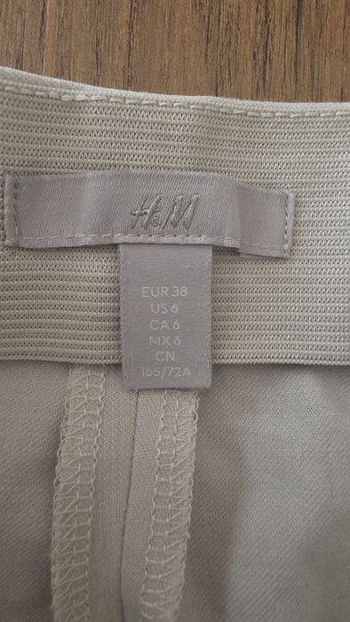 Spodnie eleganckie szeroka nogawka beżowe H&M