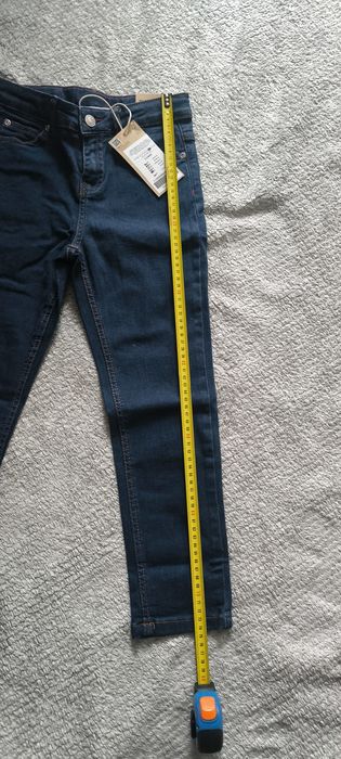 Nowe spodnie jeansowe coccodrillo r. 128