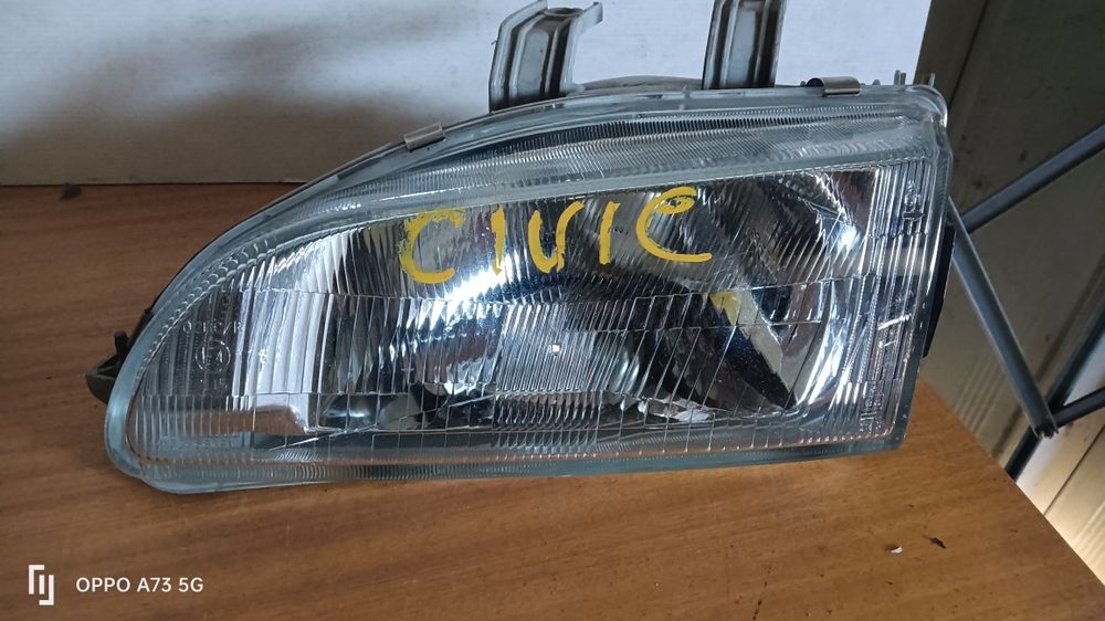 Farol Honda Civic eg5 ótica esquerda