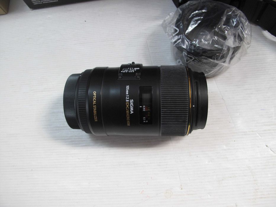 sigma 105mm 2.8 Macro para canon quanse sem uso na caixa