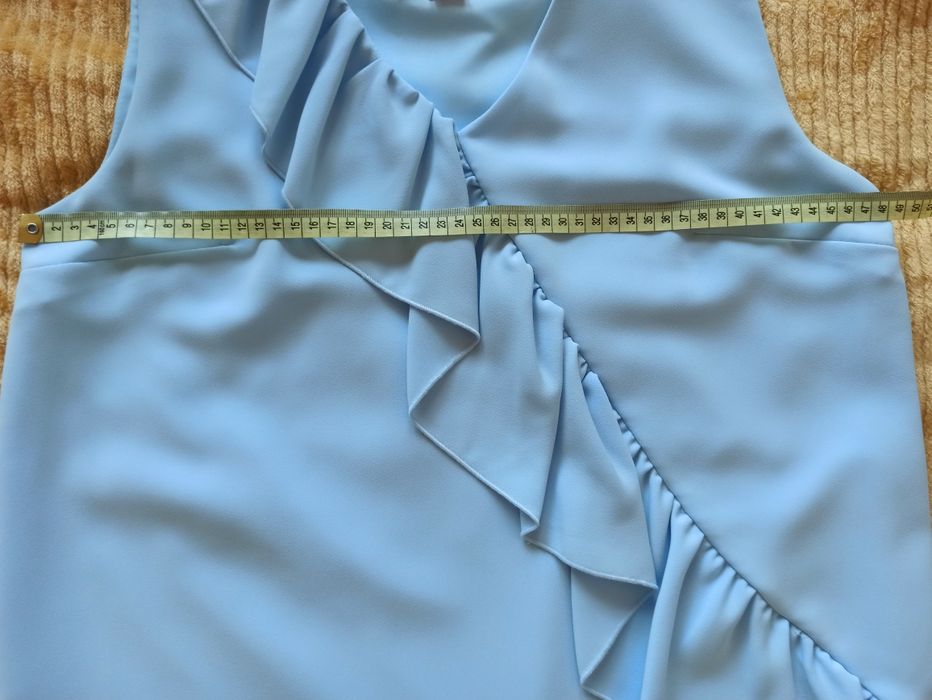 Błękitna sukienka Stone Skirts r. 40 L