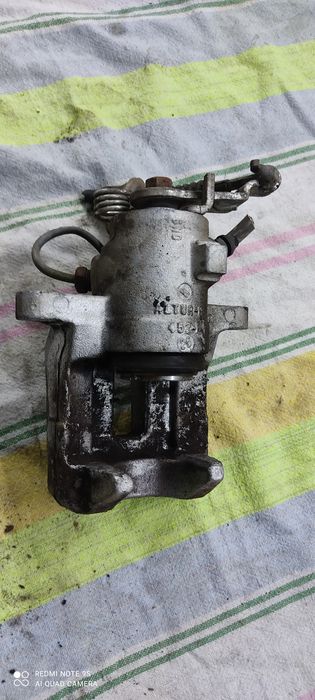 Zacisk hamulcowy lewy prawy tył Golf 5 Leon Altea Touran Audi a3