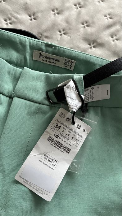 Stradivarius nowe mietowe spodnie z paskiem XS/34