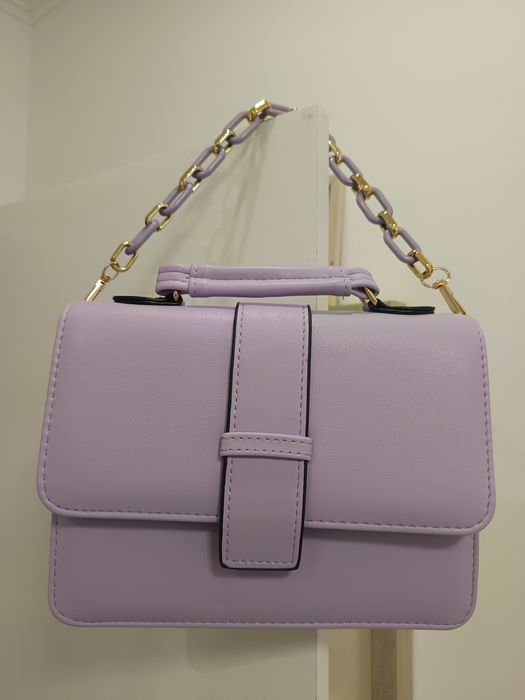 Mala de mão e a tiracolo e porta moedas