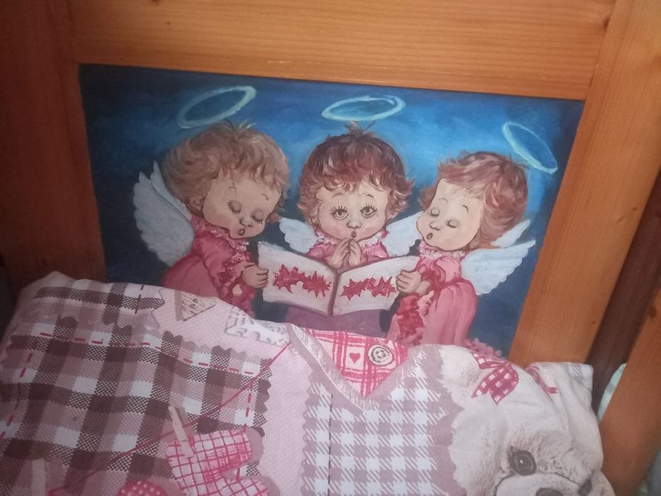Дерев'яне дитяче ліжечко