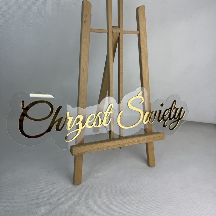 Złoty napis Chrzest Świety