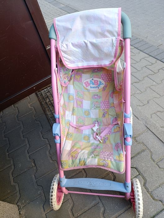 Wózek spacerowy dla lalki razem z bobasem