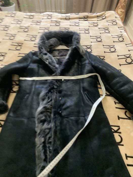 Желетка,яскрава,легенька.