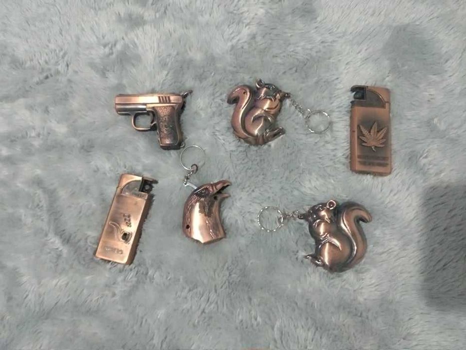 4 isqueiros em latão