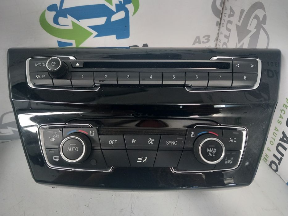 Consola central radio control ar condicionado  BMW X1