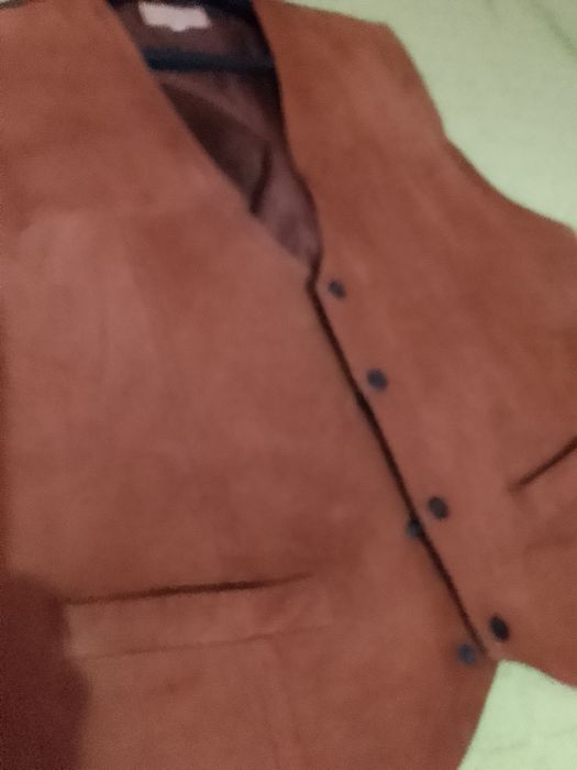 Vendo colete em em carmorça pele genuína