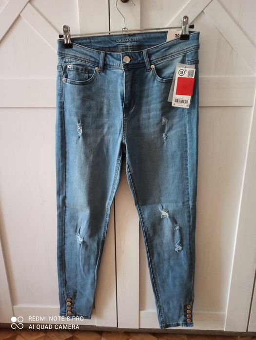 Jeansy z dziurami rozmiar m Orsay