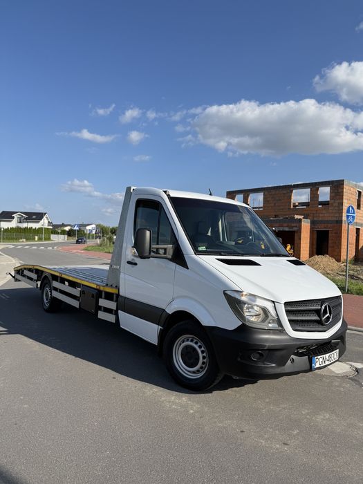 Autopomoc pomoc drogowa laweta holowanie