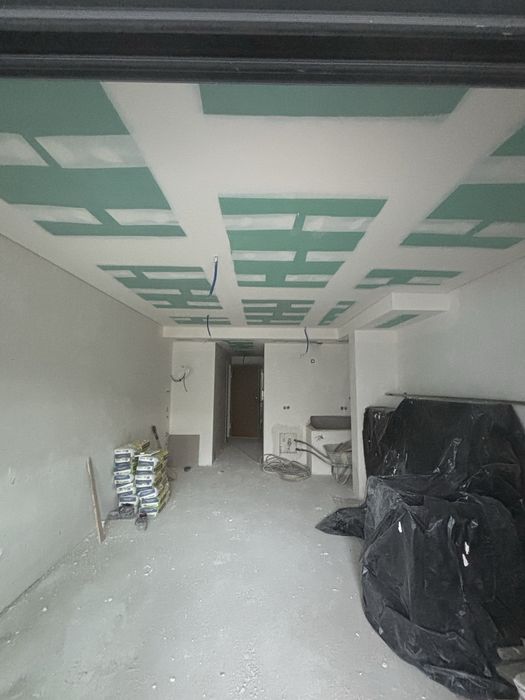 Profissional de Barramento e Acabamento em Pladur