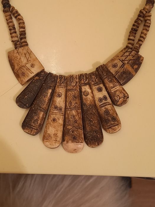 Женское украшение из кости