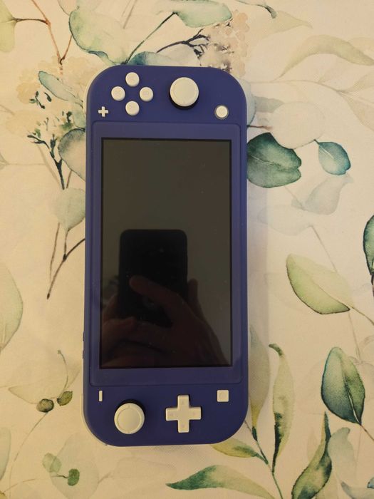 Nintendo Switch Lite w idealnym stanie
