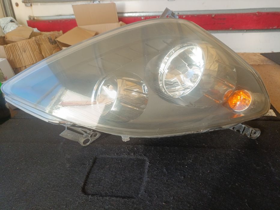 Opel Zafira B lampa  Prawa przód Oryginał EU