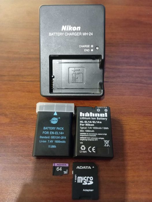 Nikon D5100 + NIKKOR 18-55mm VR + Bateria Extra + Cartão MicroSD 64GBs+ Mochila Hama