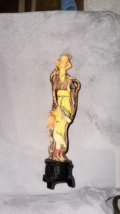 Estatua de casal japones velharia